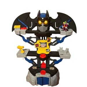 Fisher-Price Imaginext DC Super Friends Transforming Batcave Batman Joker figure